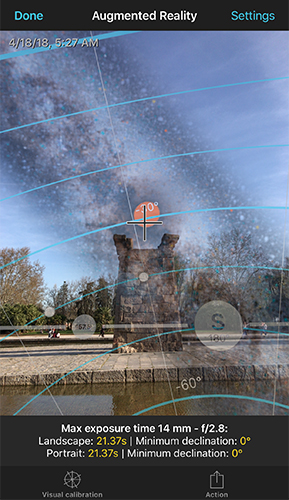 Augmented reality view showing the max exposure time overlaid on a real night scene with a monument